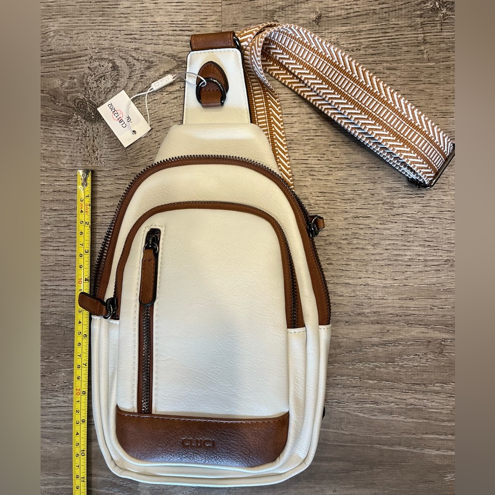 Gluci Crossbody Bag Light Beige with Brown trim.